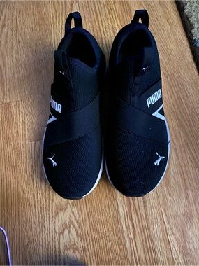 Puma Women’s Slip-On Athletic Sneakers in Black and White